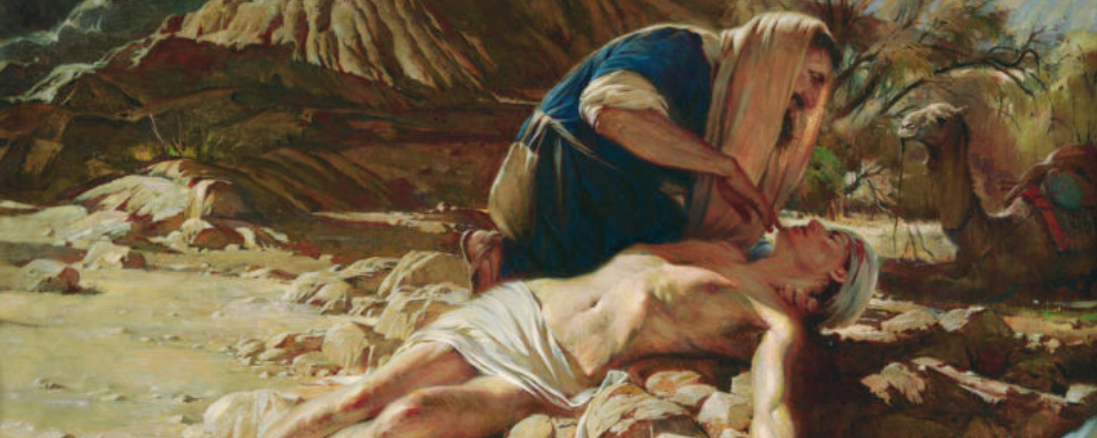 Um homem segura outro em seus braços, simbolizando a Parábola do Bom Samaritano.